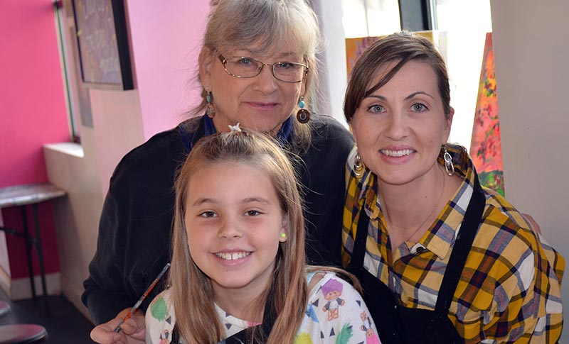 a grandmother, mother & daughter at Saratoga Paint & Sip Studio